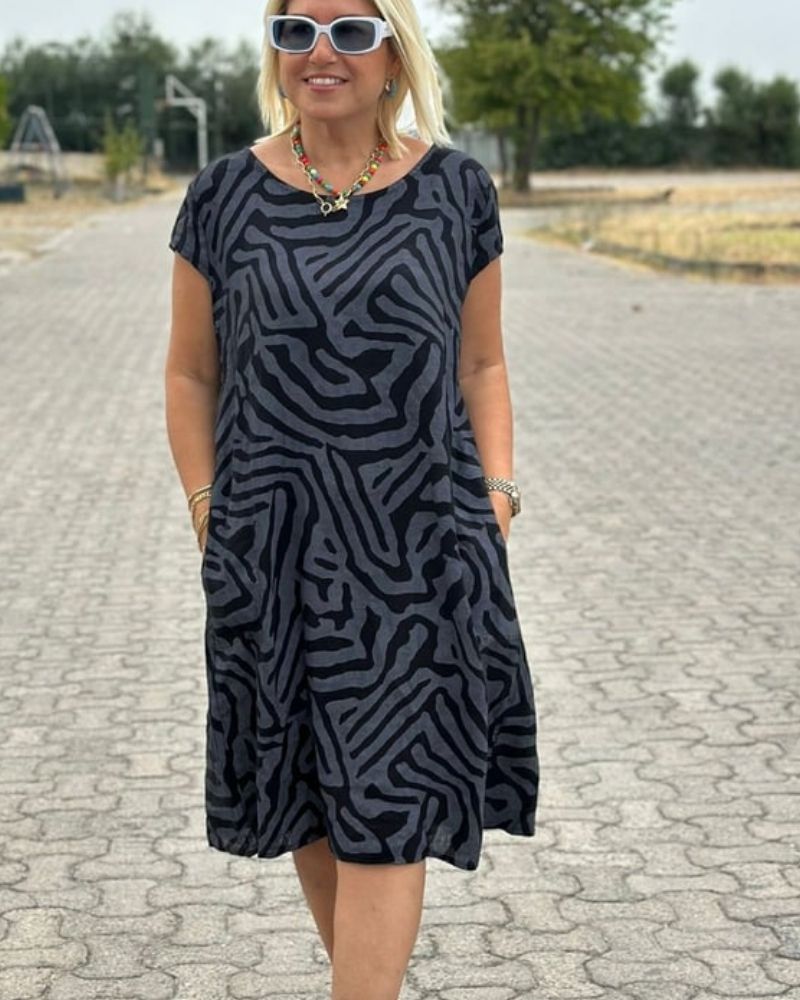 Elia - Summer dress with a round neck and a beautiful print