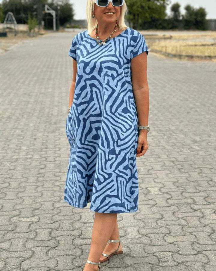 Elia - Summer dress with a round neck and a beautiful print